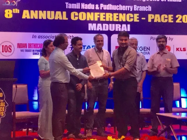 Dr. Pradeep S. receiving First Prize for scientific paper presentation at the 8th Annual Conference of AOMSI Tamil Nadu and Puducherry, Madurai 2020